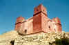 The red tower at Mellieha, photograph by David Attard  (56875 bytes)